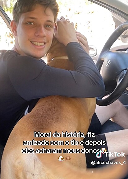 The Pitbull cuddling with Rian.