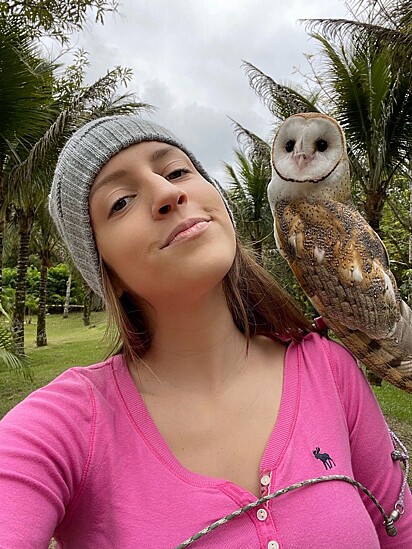 Khali, the owl, and her owner, Amanda.
