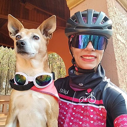 Mery loves cycling with her owner, Ana Paula.